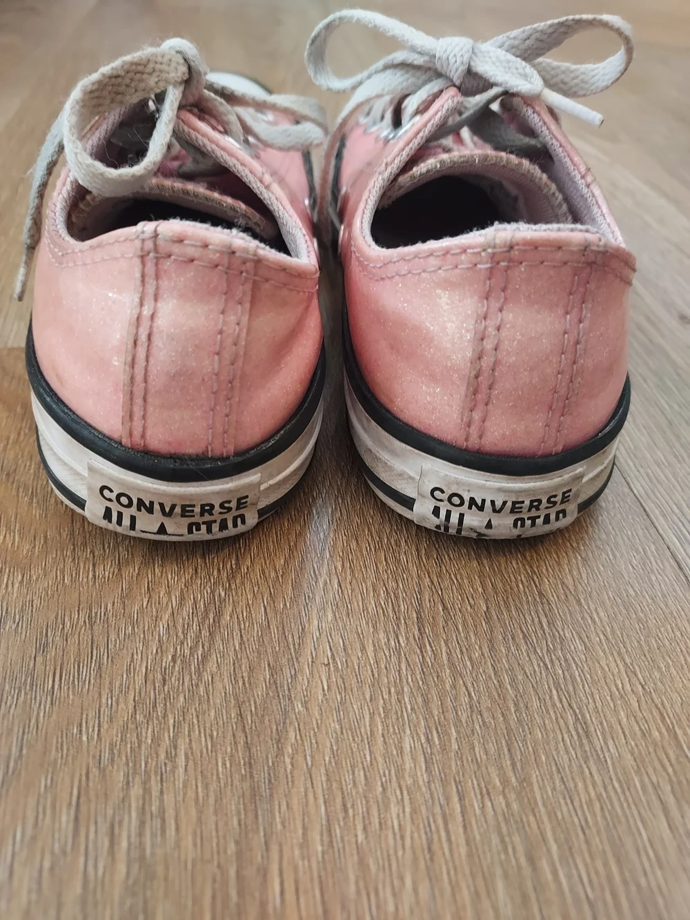 Pair Of Converse Girls Pink Canvas Sneakers And Gold Knot Sandals